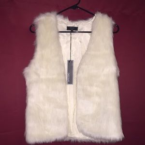 White faux fur vest